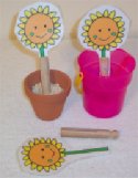 Toddlers Plant Sunflowers In Play dough